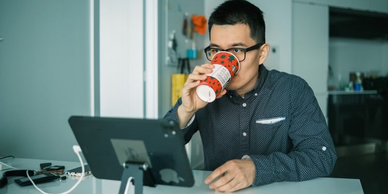 man looking at screen
